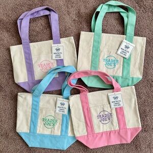 Trader Joe’s Limited Edition pastel mini canvas totes.
Set of 4. Includes pink!